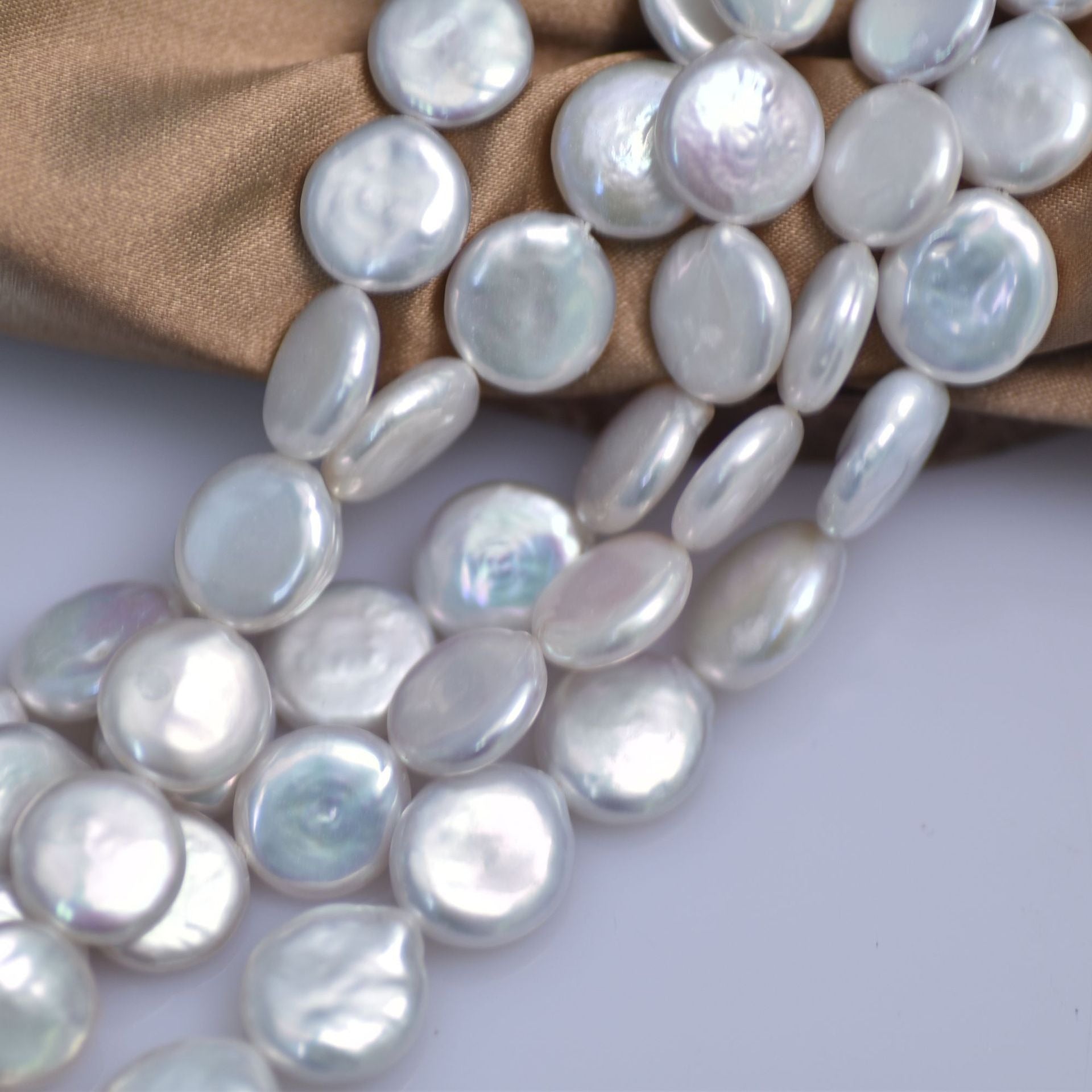 Smooth surface baroque pearl strands