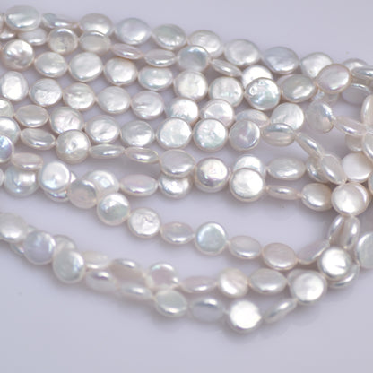 White coin shape baroque pearl strand