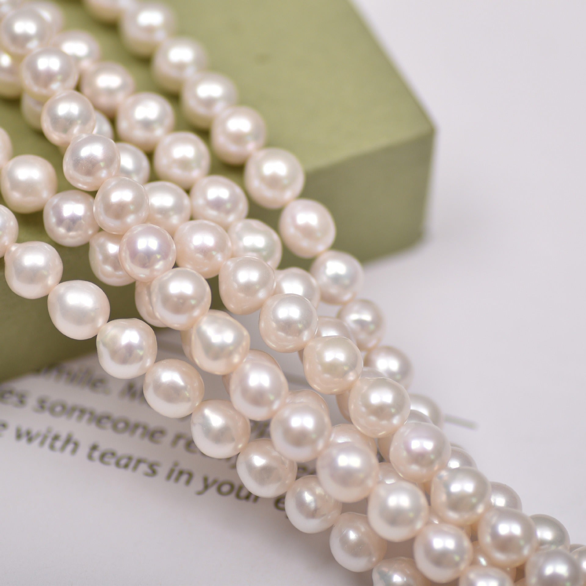 mirror luster cultured baroque pearl strands