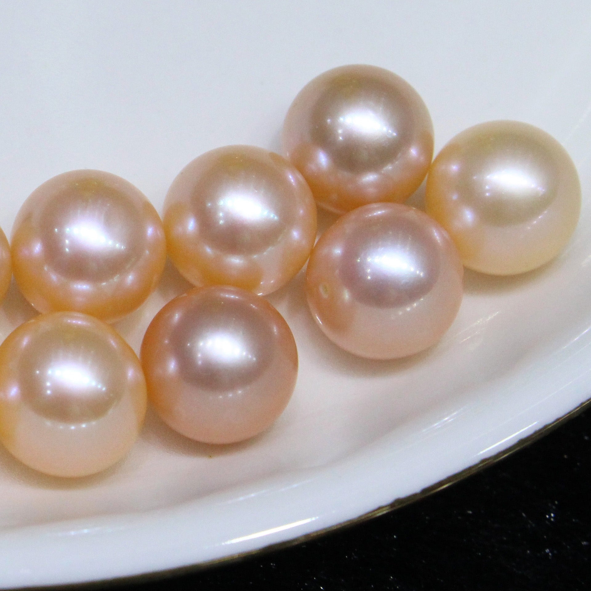 None nucleated cultured freshwater champagne color loose pearls